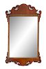* A Chippendale Style Parcel Gilt Mahogany Tablet Mirror Height 33 1/4 x width 19 inches.
