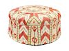 * A Modern Ikat Upholstered Ottoman Height 18 x diameter 36 1/2 inches.