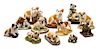* A Group of Twelve Ceramic Bulldog Figures Width of widest 8 1/2 inches.