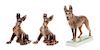 * A Group of Three Rosenthal Porcelain German Shepherds Width of widest 8 1/2 inches.