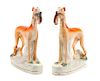 * A Pair of Staffordshire Models of Greyhounds Height 11 1/4 inches.