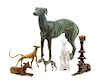 * A Group of Seven Greyhound Figures Height of tallest 12 1/4 inches.