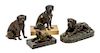 * A Group of Four Bronze Mastiff Figures Width of widest 9 1/2 inches.
