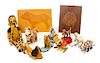 * A Group of Eleven Dog Toys depicting Various Breeds Width of widest 10 3/4 inches.