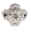 An Art Deco Diamond Filigree Ring in Platinum