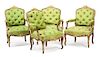A Set of Four Louis XV Style Parcel Gilt Fauteuils Height 39 inches.