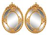 A Pair of Large Louis XV Style Giltwood and Gesso Mirrors Height 73 1/2 x width 53 inches.