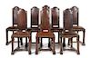 A Set of Eight Italian Oak Monastery Chairs Height 40 1/2 inches.