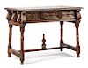 A Portuguese Renaissance Style Walnut Table Height 36 x width 50 x depth 26 inches.