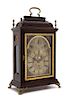 * An Austrian Gilt Bronze Mounted Mahogany Table Clock Height 17 x width 12 x depth 6 1/2 inches.