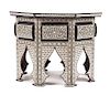 A Moorish Style Mother-of-Pearl Inlaid Table Height 22 1/2 x width 31 1/2 inches.