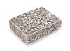 * An Italian Silver Compact, First Half 20th Century, the case worked to show floral and foliate scroll decoration, opening to a