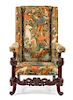 A Jacobean Style Wingback Armchair Height 50 inches.