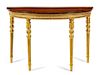A George III Giltwood, Satinwood and Marquetry Console Table Height 33 3/4 x width 52 1/4 x depth 21 1/2 inches.