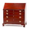 A George III Mahogany Slant-Front Desk Height 41 x width 38 x depth 21 1/2 inches.