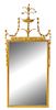 An Adam Style Giltwood Mirror Height 48 x width 21 inches.