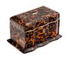 * An English Silver-Lined Tortoise Shell Tea Caddy Height 4 x width 7 1/4 inches.