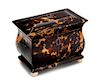 * An English Silver-Inlaid Tortoise Shell Tea Caddy Height 4 1/4 x width 5 5/8 inches.