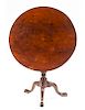 An American Mahogany Tea Table Height 31 x diameter of top 35 inches.