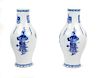 A Pair of Chinese Blue and White Porcelain Vases Height 15 1/2 inches.