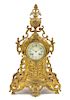 * A French Neoclassical Gilt Metal Mantel Clock Height 20 3/4 x width 11 1/2 x depth 4 inches.