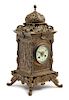 * A French Neoclassical Brass Mantel Clock Height 17 x width 9 x depth 8 1/4 inches.