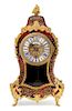 * A German Boulle Marquetry Mantel Clock Height 12 1/2 x width 6 1/4 x depth 3 1/2 inches.