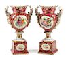 A Pair of German Porcelain Urns Height 18 1/2 inches.
