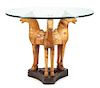 A Carved Wood and Glass Figural Table Height 30 1/2 x diameter of top 39 1/2 inches.