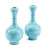A Pair of Chinese Celeste Bleu Glazed Porcelain Vases Height 10 1/2 inches.