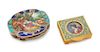 A Group of Two Continental Enameled Compacts, Early 20th Century, comprising a Continental silver compact and a gilt metal compa