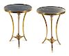 A Pair of Neoclassical Gilt Bronze Gueridons Height 29 x diameter of top 20 inches.