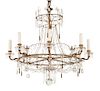 A Regency Style Gilt Metal and Crystal Eight-Light Chandelier Height 32 x diameter 31 inches.