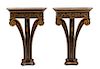 A Pair of Regency Style Black and Gilt Decorated Demilune Wall Mounted Console Tables Height 34 3/4 x width 23 x depth 8 inches.