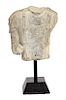 A Chinese Carved Stone Torso Fragment Height of fragment 11 x width 10 inches.