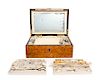 An Impressive French Gold and Mother-of-Pearl Sewing Box, Height of box 4 1/4 x width 10 5/8 x depth 7 3/8 inches.