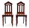 A Pair of Regency Style Grain-Painted Hall Chairs Height 36 inches.