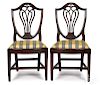 Pair of Federal carved mahogany shieldback dining chairs