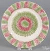Red and green spatterware bull's-eye plate, 19th c., 9 1/2'' dia.
