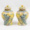 Pair of Chinese Yellow Ground Famille Rose Porcelain Baluster Form Jars and Covers