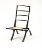 ENGLISH AESTHETIC MOVEMENT EBONIZED FOLDING CHAIR, IN THE MANNER OF E.W. GODWIN