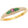 A ruby, emerald and diamond 18K yellow gold bangle bracelet.