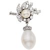 A cultured pearl and diamond 18K white gold brooch.