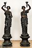 Pair of Life-Size Bronze Statues: Woman with Torch on Pedestal