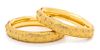 A Pair of 18 Karat Yellow Gold and Diamond Bangle Bracelets, Vendorafa, 50.50 dwts.