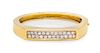 A Bicolor Gold and Diamond Bangle Bracelet, 23.20 dwts.