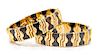 A Pair of 18 Karat Yellow Gold and Anodized Steel Bangle Bracelets, Dino Ceva, 80.10 dwts.