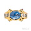 18kt Gold, Sapphire, and Diamond Ring, Bulgari, centering a cabochon sapphire, with channel-set diamonds and ruby accents, size 5 1/2,