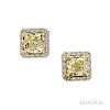 Colored Diamond Earstuds, set with cushion-cut yellow diamonds measuring approx. 6.65 x 6.80 and 6.40 x 6.80 mm, framed by diamond mele