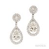 Platinum and Diamond Earpendants, set with pear-shape diamonds weighing 6.13 and 5.50 cts., framed by full-cut diamonds, lg. 1 3/4 in.